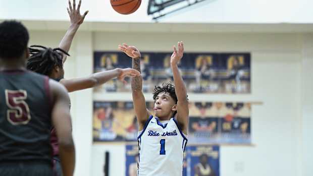 Quinn Barnett of Brunswick takes a jump shot against Akron Garfield during a district semifinal on March 6, 2024.